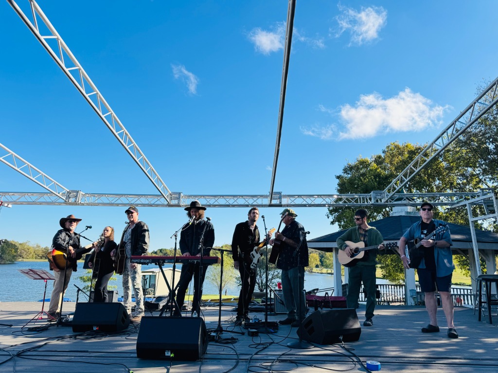 The Joslin Brothers and 8 G4V Combat Veterans performing 'Drift Away' together on the Queenslake waterfront stage